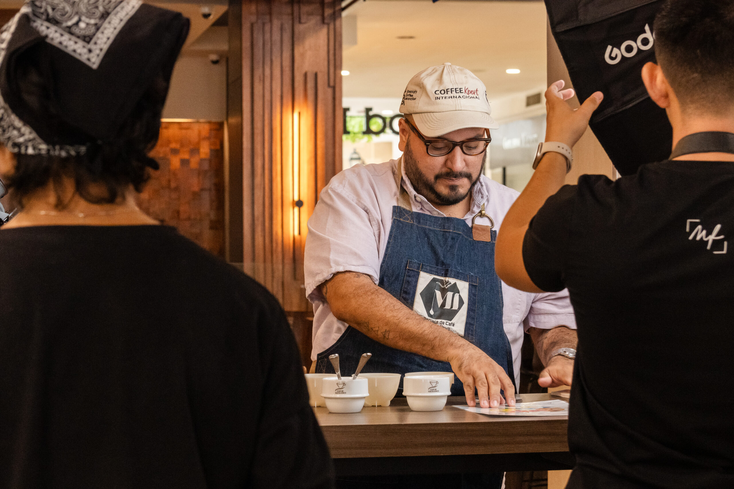 Coffee consultant helping choose espresso machines menus suppliers training and operations